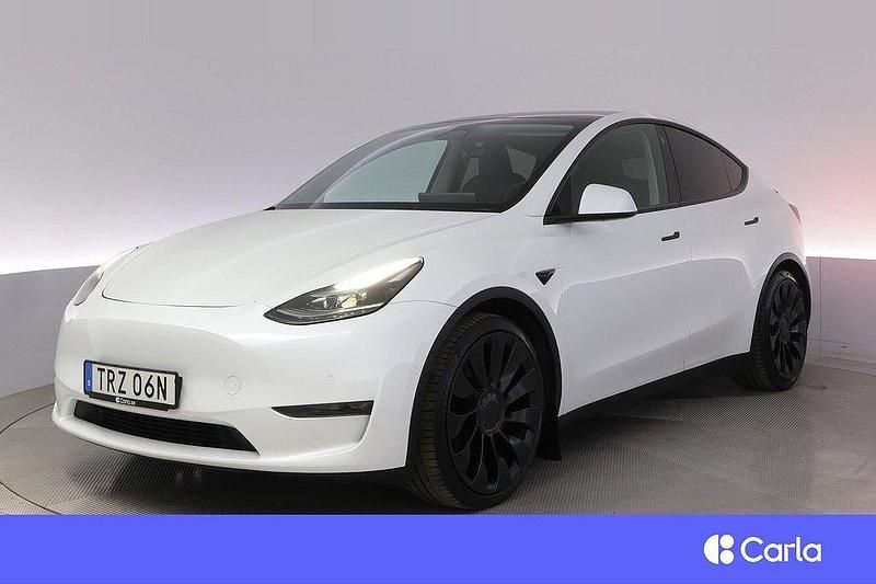 Mörkblå (vit) Begagnad 2022 Tesla Model Y Performance SUV | 409 900 kr (Marknadspris) - Bild 1/4
