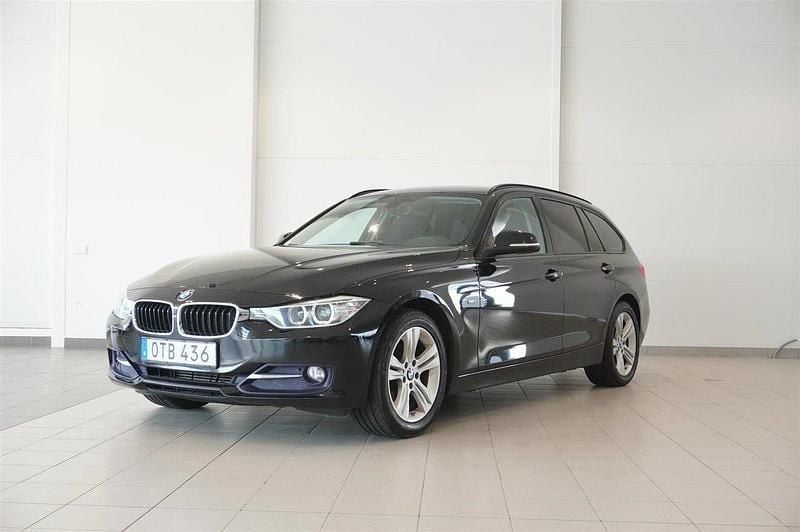 Svart Begagnad 2014 BMW 318 Sport Line Kombi | 129 800 kr (Marknadspris) - Bild 1/4