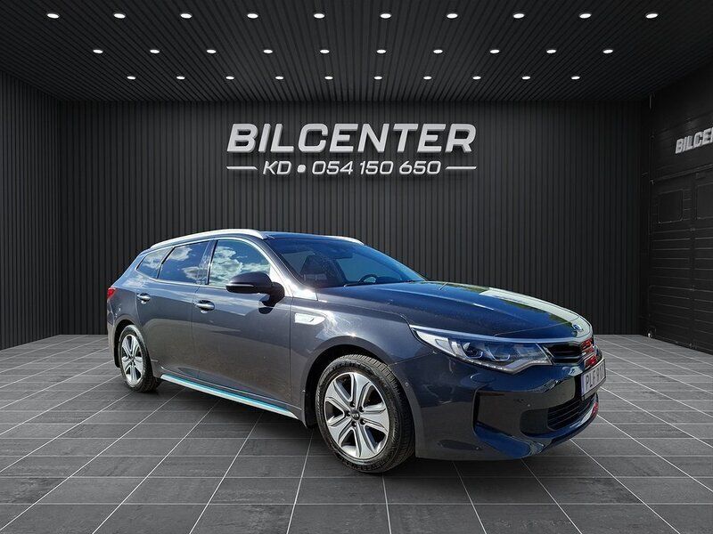 Grå Begagnad 2017 Kia Optima Hybrid Comfort Sedan | 179 900 kr (Lite dyr) - Bild 1/4