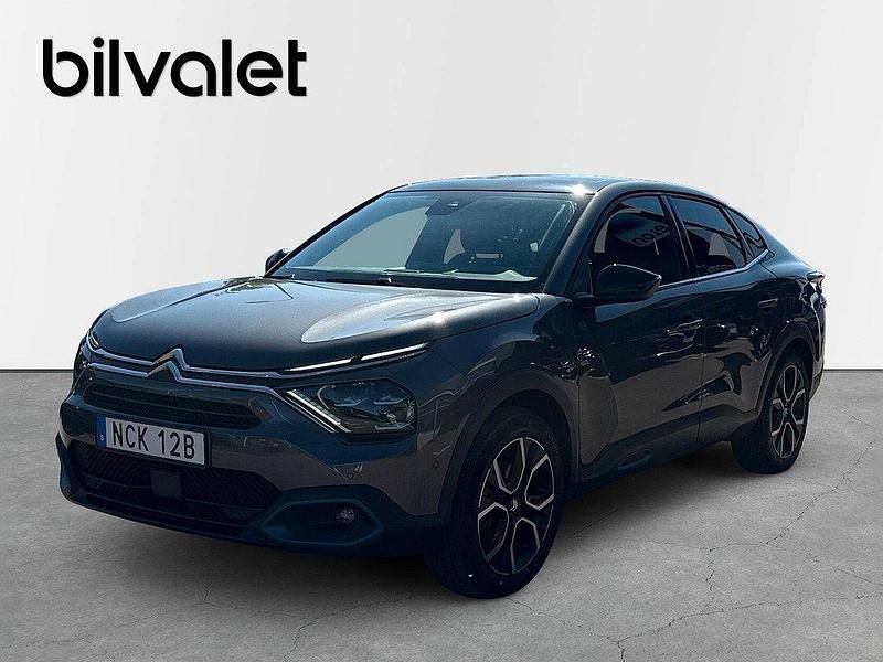 Grå Begagnad 2023 Citroën e-C4 Exclusive Sedan | 229 900 kr (Bra pris) - Bild 1/4