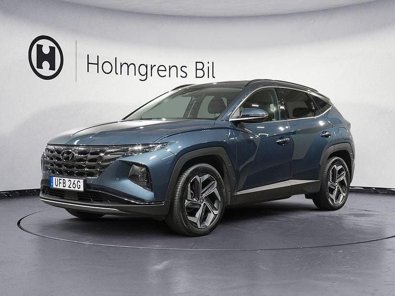 Blå (dark teal metallic) Begagnad 2023 Hyundai Tucson Advanced SUV | 409 900 kr (Dyr) - Bild 1/4