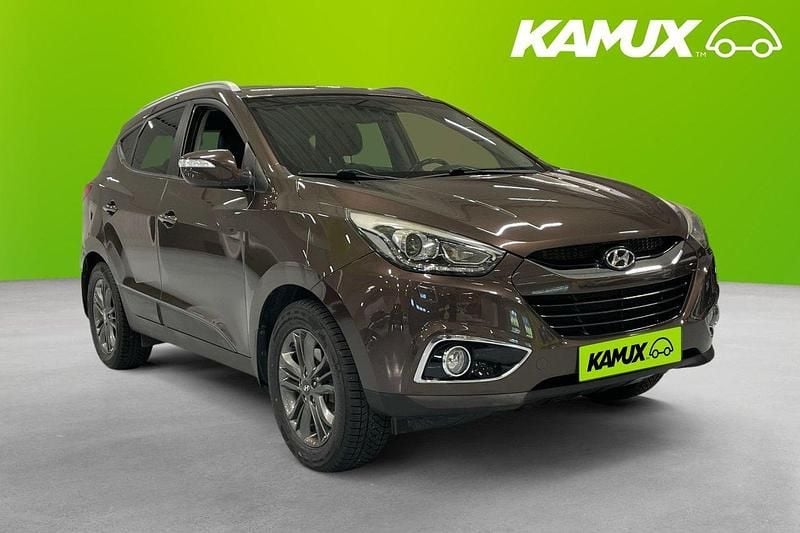 Brun Begagnad 2014 Hyundai ix35 Premium SUV | 139 800 kr (Marknadspris) - Bild 1/4