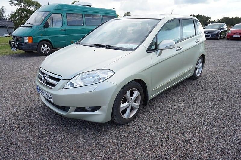 Ljusgrön (grön metallic) Begagnad 2006 Honda FR-V Minibuss | 19 900 kr (Marknadspris) - Bild 1/4