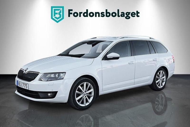 Vit Begagnad 2014 Skoda Octavia Business Line Kombi | 119 900 kr (Marknadspris) - Bild 1/4