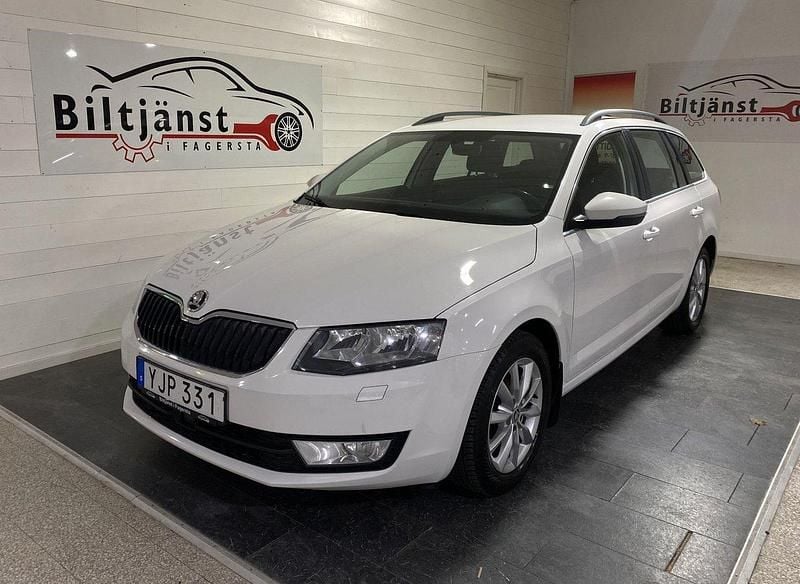 Vit Begagnad 2017 Skoda Octavia Ambition Kombi | 109 900 kr (Marknadspris) - Bild 1/4