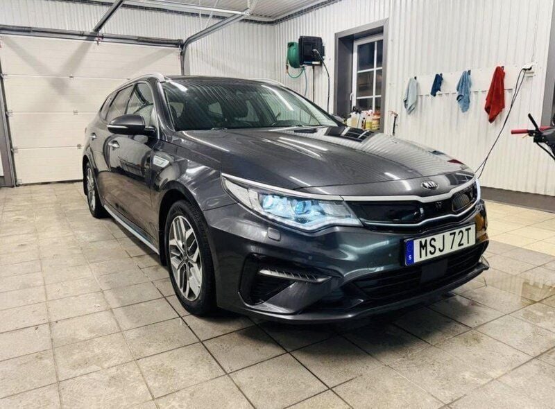 Grå Begagnad 2019 Kia Optima Hybrid Advance Sedan | 128 900 kr (Marknadspris) - Bild 1/4