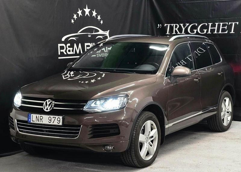 Mörkbrun Begagnad 2010 VW Touareg SUV | 119 800 kr (Marknadspris) - Bild 1/4