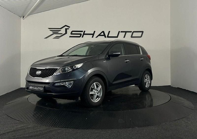 Grå Begagnad 2015 Kia Sportage SUV | 134 900 kr (Marknadspris) - Bild 1/4