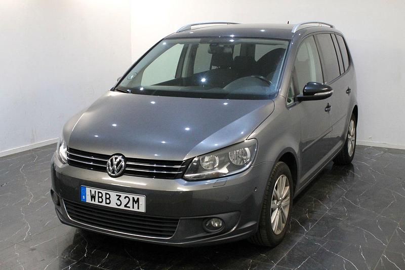 Begagnad VW Touran Comfortline 105 HK (77 kW) 2011 Mörkgrå Minibuss
