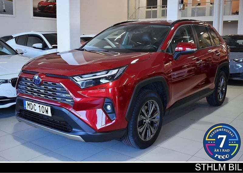 Röd Begagnad 2021 Toyota RAV4 Hybrid Executive SUV | 369 000 kr (Marknadspris) - Bild 1/4