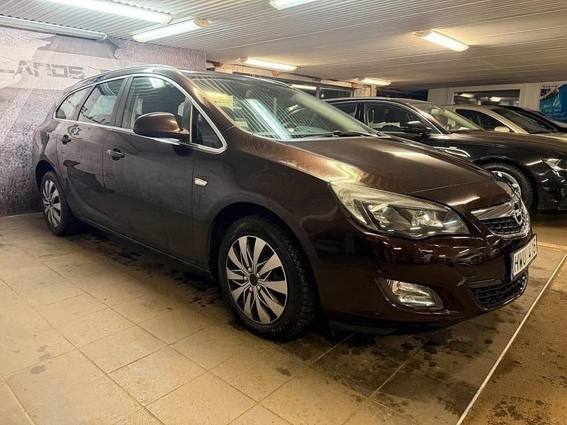 Brun Begagnad 2012 Opel Astra Enjoy Kombi | 39 900 kr (Marknadspris) - Bild 1/4