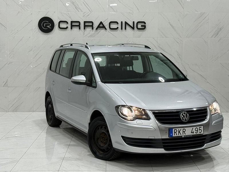 Silver Begagnad 2010 VW Touran Minibuss | 34 900 kr (Marknadspris) - Bild 1/4