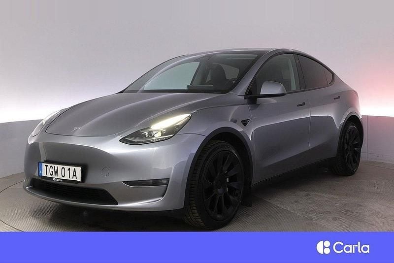 Grå Begagnad 2023 Tesla Model Y Long Range AWD SUV | 439 900 kr (Marknadspris) - Bild 1/4