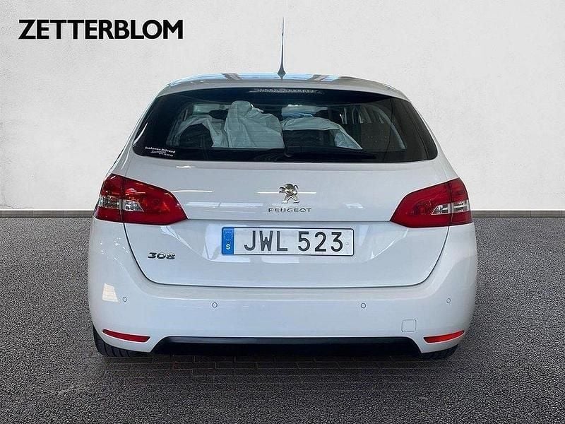 Begagnad Peugeot 308 111 HK (81 kW) 2015 Vit Kombi