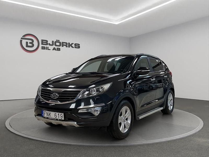 Svart Begagnad 2012 Kia Sportage Comfort SUV | 88 500 kr (Marknadspris) - Bild 1/4