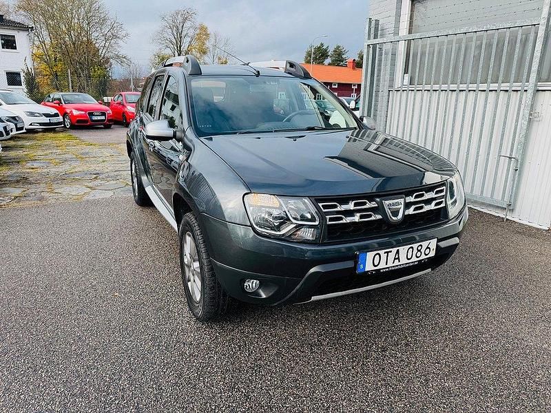 Mörkgrå Begagnad 2014 Dacia Duster SUV | 99 900 kr (Marknadspris) - Bild 1/4