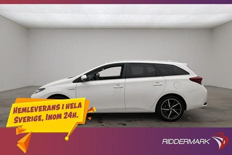 Vit Begagnad 2017 Toyota Auris Hybrid Kombi | 164 800 kr (Marknadspris) - Bild 1/3
