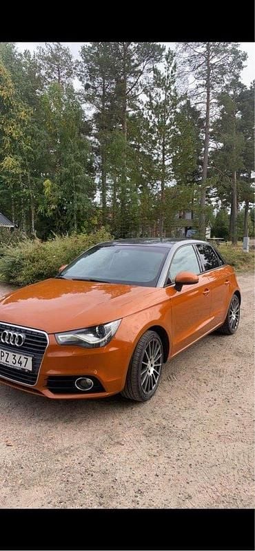 Orange Begagnad 2014 Audi A1 Sportback Sport Halvkombi | 83 000 kr (Marknadspris) - Bild 1/4