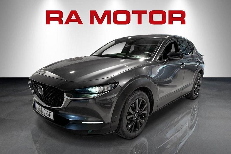 Grå Begagnad 2024 Mazda CX-30 Homura-Line SUV | 299 800 kr - Bild 1/4