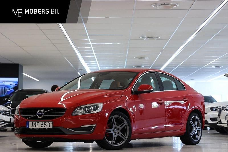 Röd Begagnad 2014 Volvo S60 Summum Sedan | 119 900 kr (Marknadspris) - Bild 1/3