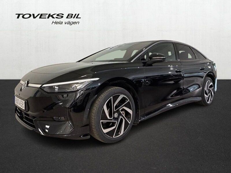Svart (grenadilla black metallic) Begagnad 2023 VW ID.7 Pro Sedan | 509 000 kr - Bild 1/4