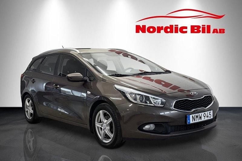 Ljusbrun (brun) Begagnad 2014 Kia Ceed Sportswagon EX Kombi | 89 900 kr (Marknadspris) - Bild 1/4