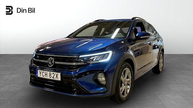 Blå (reef blue metallic) Begagnad 2022 VW Taigo R-line SUV | 249 000 kr (Marknadspris) - Bild 1/3