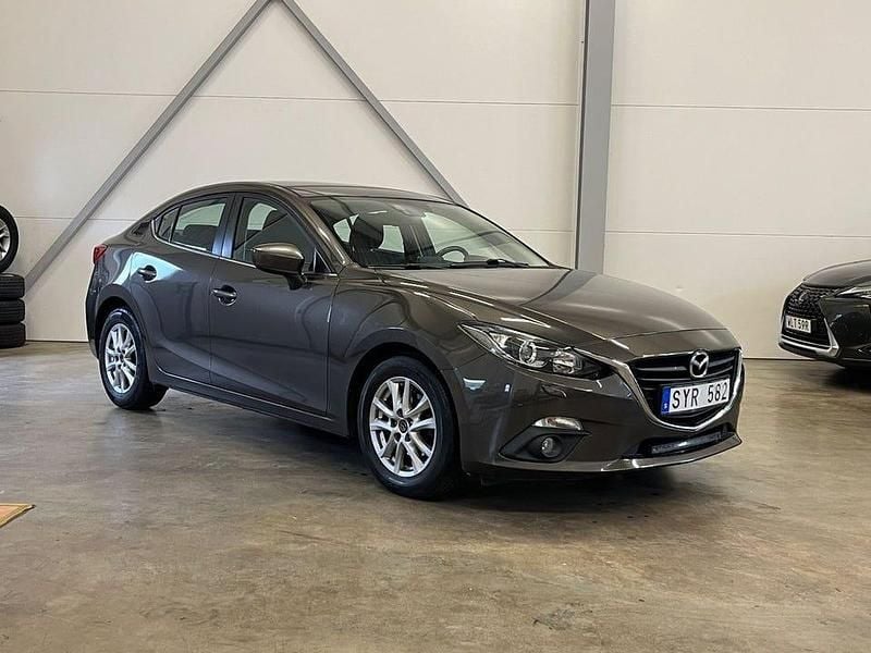 Brun Begagnad 2013 Mazda 3 Sedan | 89 900 kr (Marknadspris) - Bild 1/4