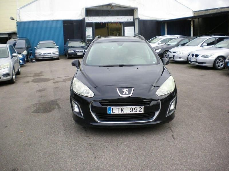 Begagnad Peugeot 308 SW 112 HK (82 kW) 2011 Svart Kombi