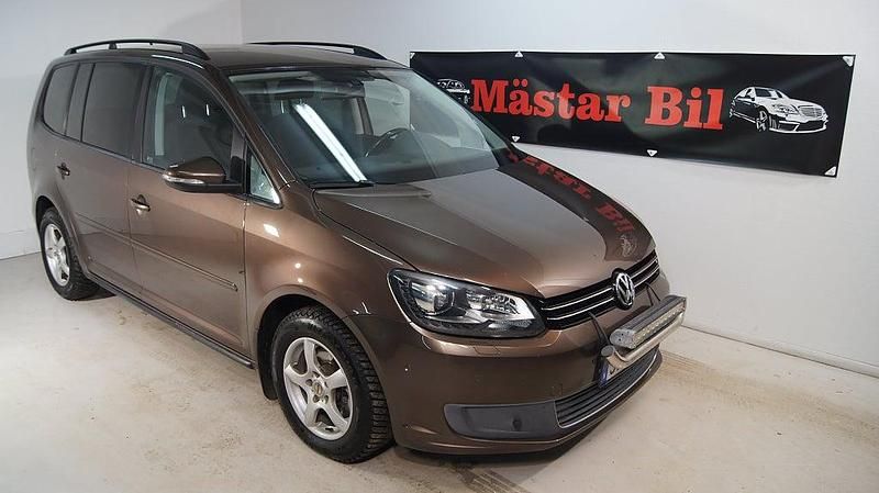 Brun Begagnad 2010 VW Touran Minibuss | 54 900 kr (Marknadspris) - Bild 1/4