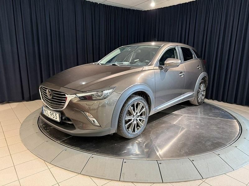 Brun metallic Begagnad 2015 Mazda CX-3 Optimum SUV | 154 000 kr (Marknadspris) - Bild 1/4