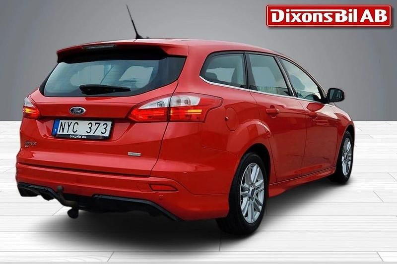 Begagnad Ford Focus Titanium 101 HK (74 kW) 2013 Röd Kombi