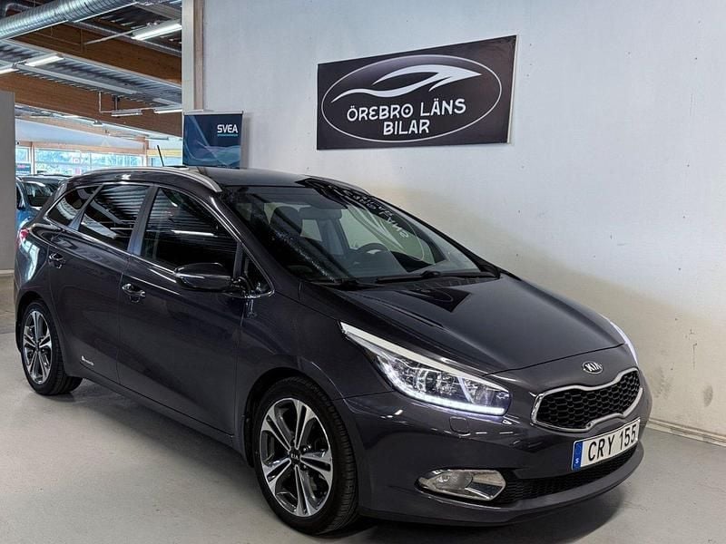 Grå Begagnad 2014 Kia Ceed Kombi | 114 900 kr (Marknadspris) - Bild 1/4