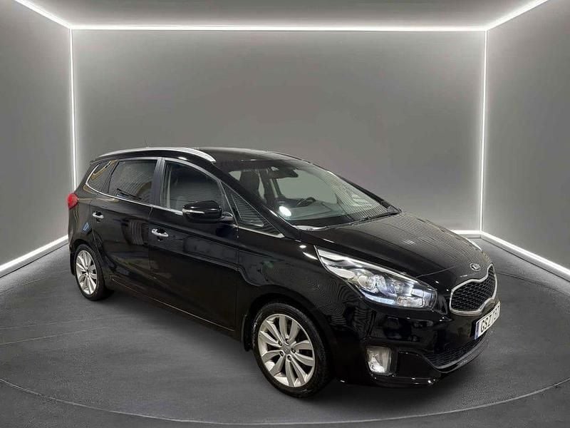 Svart Begagnad 2013 Kia Carens Minibuss | 74 900 kr (Marknadspris) - Bild 1/4