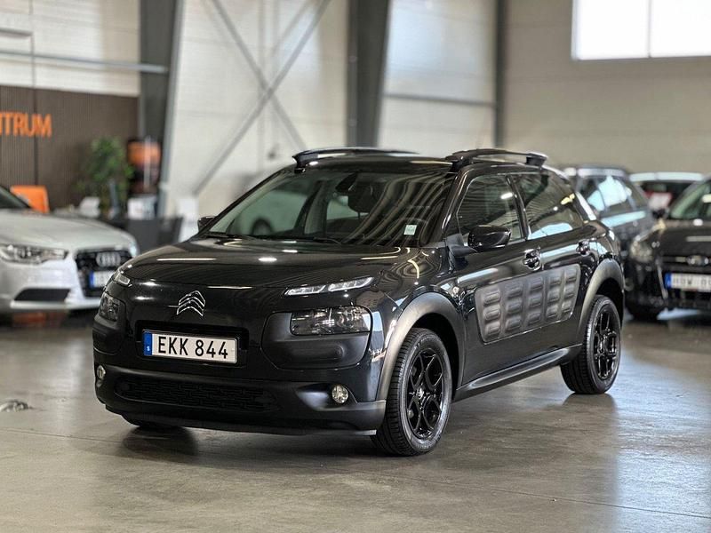 Svart Begagnad 2014 Citroën C4 Cactus PureTech Halvkombi | 59 900 kr (Marknadspris) - Bild 1/4