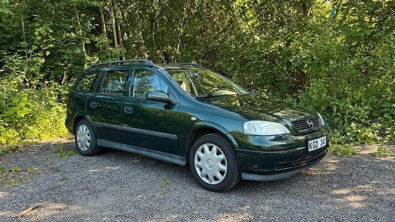 Mörkgrön Begagnad 1999 Opel Astra Kombi | 13 000 kr (Marknadspris) - Bild 1/4