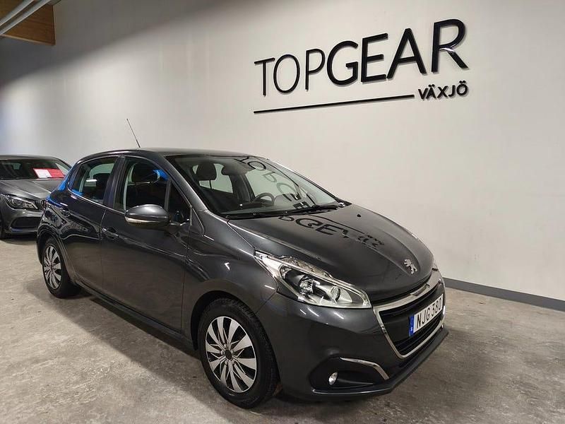 Mörkgrå Begagnad 2016 Peugeot 208 Halvkombi | 74 900 kr (Marknadspris) - Bild 1/4