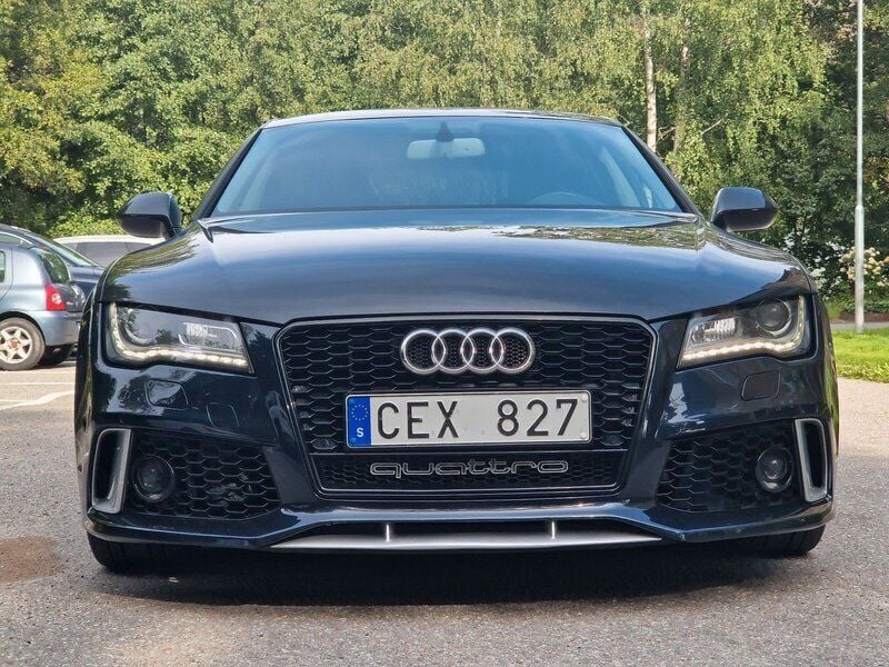Svart Begagnad 2011 Audi RS7 Halvkombi | 234 800 kr - Bild 1/4