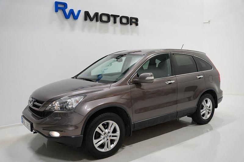 Grå Begagnad 2012 Honda CR-V SUV | 114 900 kr (Marknadspris) - Bild 1/4