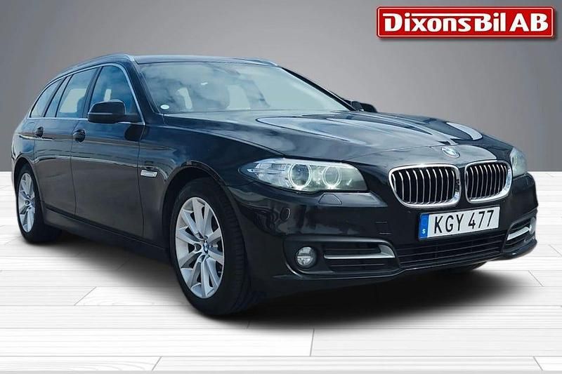 Svart Begagnad 2015 BMW 520 Kombi | 144 500 kr (Marknadspris) - Bild 1/4