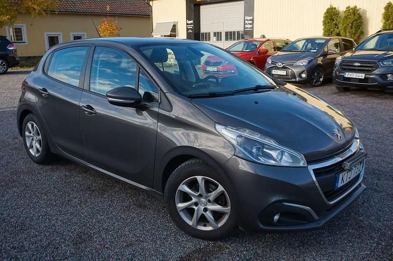 Mörkgrå (grå) Begagnad 2018 Peugeot 208 Halvkombi | 74 900 kr (Bra pris) - Bild 1/4