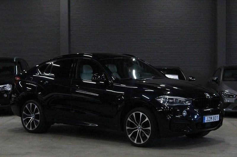 Svart (carbonsvart metallic) Begagnad 2016 BMW X6 M Sport SUV | 414 900 kr - Bild 1/4