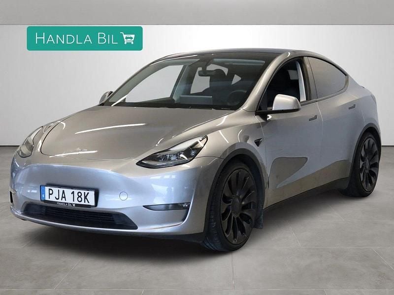 Grå Begagnad 2023 Tesla Model Y Performance SUV | 459 000 kr (Marknadspris) - Bild 1/4
