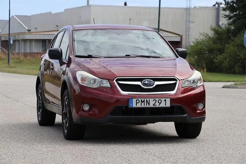 Ljusröd Begagnad 2013 Subaru XV SUV | 149 900 kr (Lite dyr) - Bild 1/4