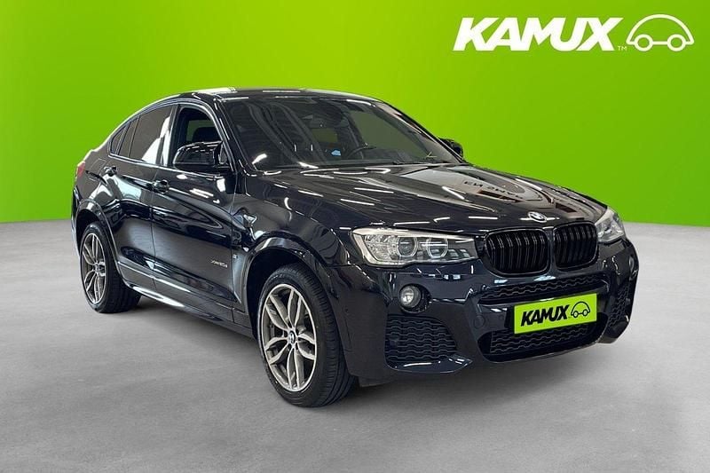Svart Begagnad 2015 BMW X4 M Sport SUV | 239 900 kr (Marknadspris) - Bild 1/3