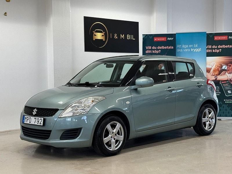 Begagnad Suzuki Swift 94 HK (69 kW) 2011 Grön Halvkombi