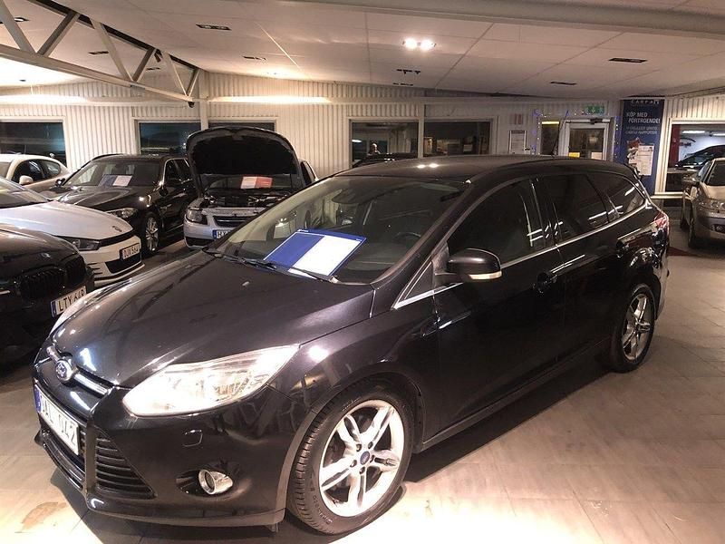 Svart Begagnad 2014 Ford Focus Titanium Kombi | 73 000 kr - Bild 1/4