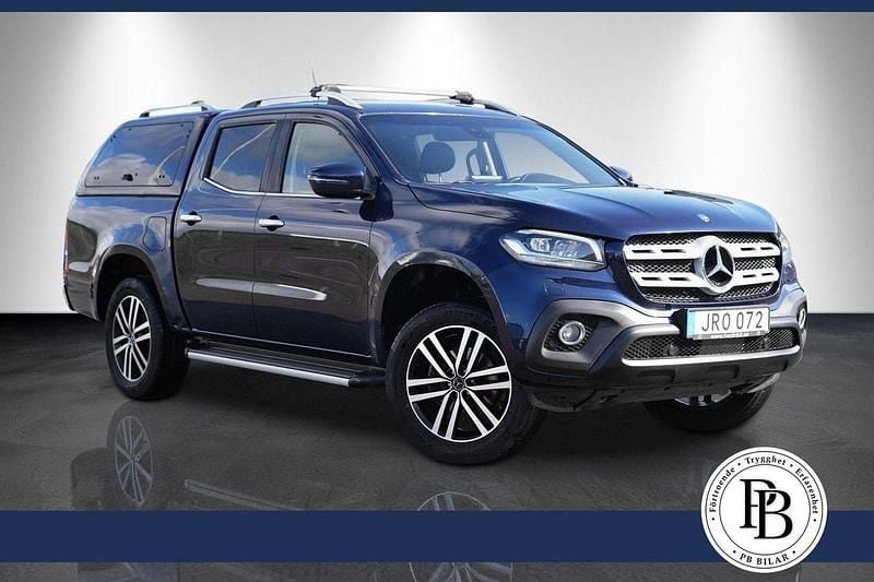 Mörkblå (blå) Begagnad 2018 Mercedes X250 Progressive Pickup | 269 900 kr (Marknadspris) - Bild 1/4