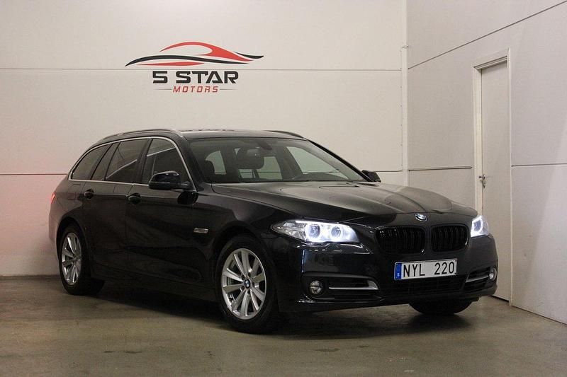 Svart Begagnad 2013 BMW 520 Kombi | 136 900 kr (Marknadspris) - Bild 1/4