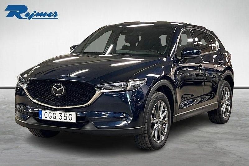 Blå Begagnad 2019 Mazda CX-5 Signature SUV | 269 800 kr (Marknadspris) - Bild 1/4